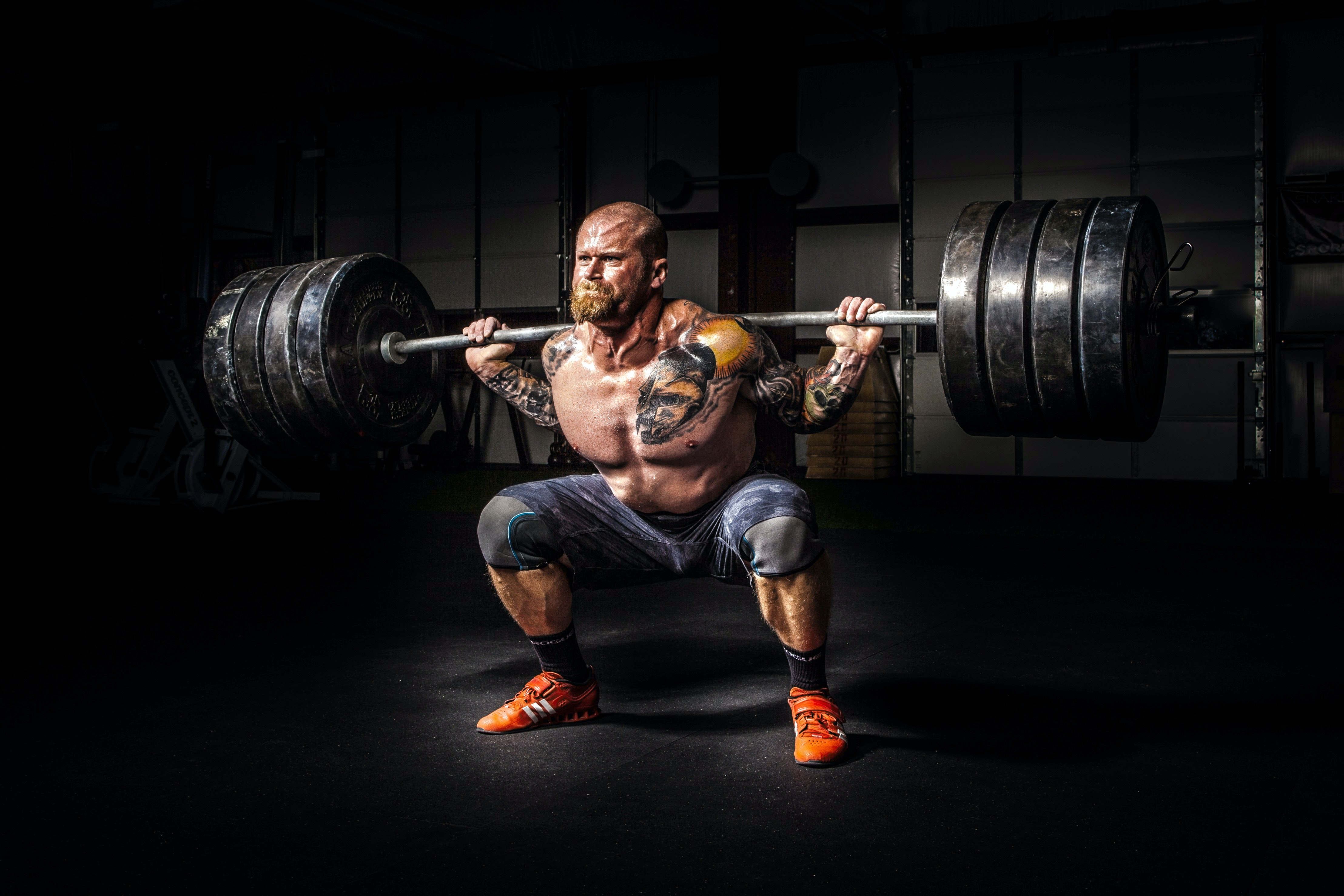 Photo of one of the members doing heavy squats.